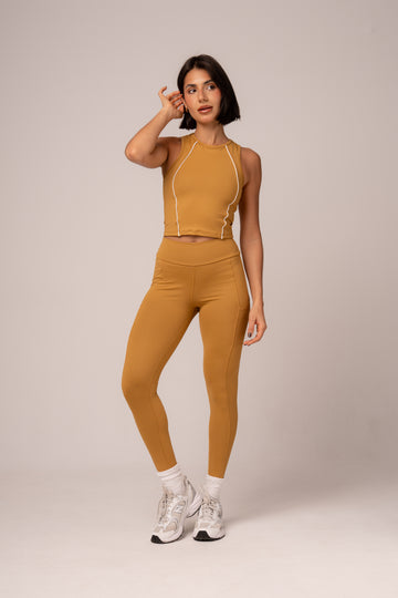 Conjunto Legging bolsos e Top Alongado Cosmo Mostarda